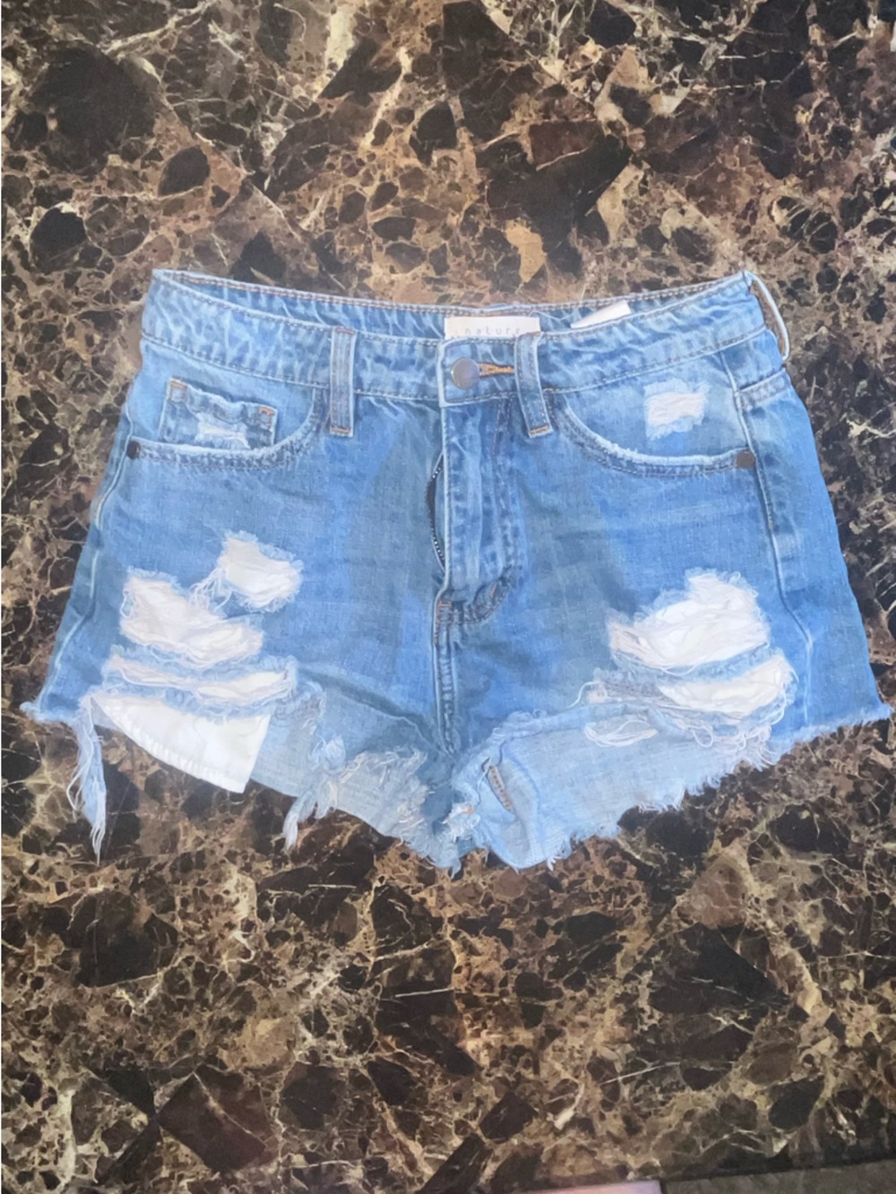 Distressed Light Blue Denim Cutoff Shorts